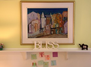 Bliss sign on shelf with painting